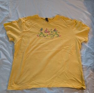 Yellow Butterfly World T-Shirt with Floral Design